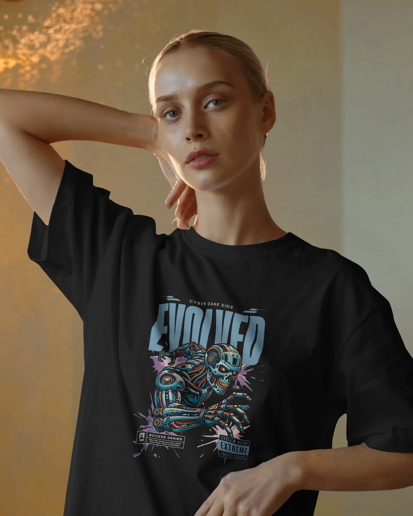 Woman in Qurrito’s Evolved Cyberpunk Oversized T-Shirt – Dark Side Edition styled with neutral trousers, creating a confident and mysterious cyberpunk streetwear mood outfit for women. The bold robot print makes this black tee ideal for urban fashion and casual futuristic looks.