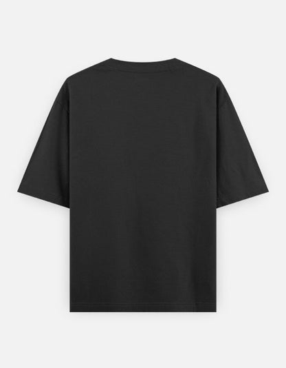 Oversized black t-shirt with upside-down turquoise teddy and "RELAXED" graphic, made from soft casual chillwear cotton.