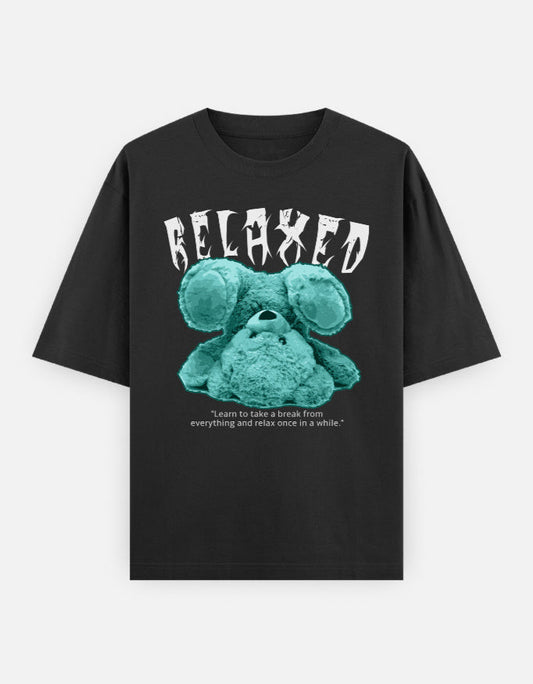 Oversized black t-shirt with upside-down turquoise teddy and "RELAXED" graphic, made from soft casual chillwear cotton.