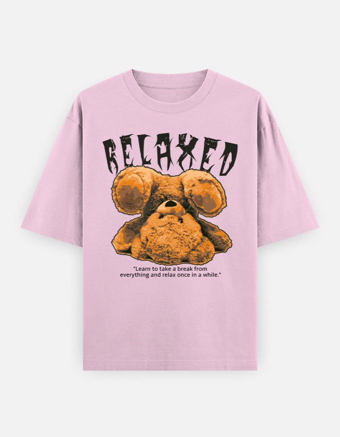 Pink casual cotton oversized t-shirt with upside-down teddy graphic and “RELAXED” text, perfect for laid-back, cozy streetwear looks.