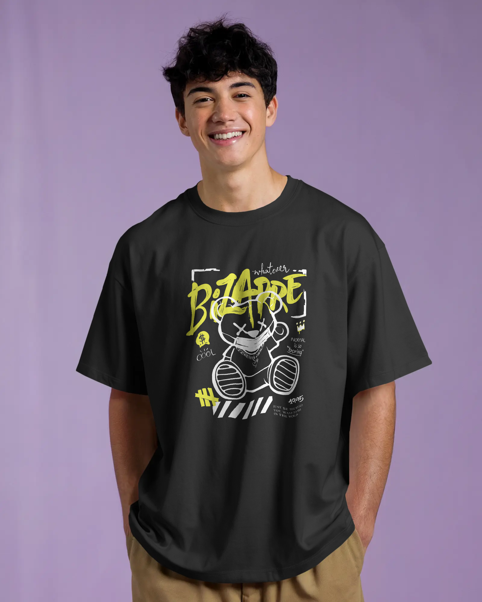 a man wearing Oversized Graphic T-Shirt – Bizarre Bear Streetwear by Qurrito