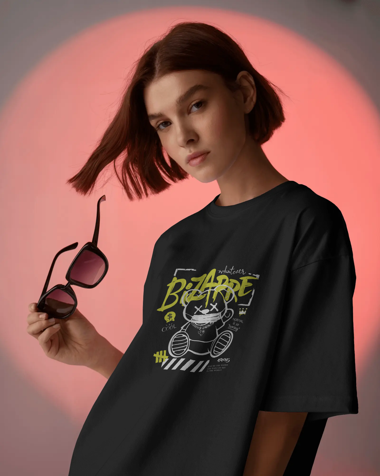 a woman wearing Oversized Graphic T-Shirt – Bizarre Bear Streetwear by Qurrito