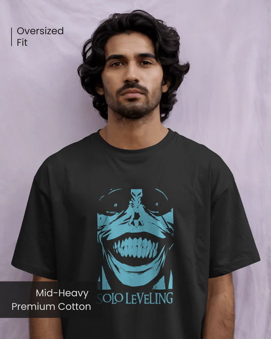 Male model wearing Qurrito’s dark mysterious mood Anime Streetwear T-Shirt featuring the Statue of God from Solo Leveling in blue print on black oversized cotton fabric, perfect for fans of Korean anime streetwear and dark aesthetic fashion.