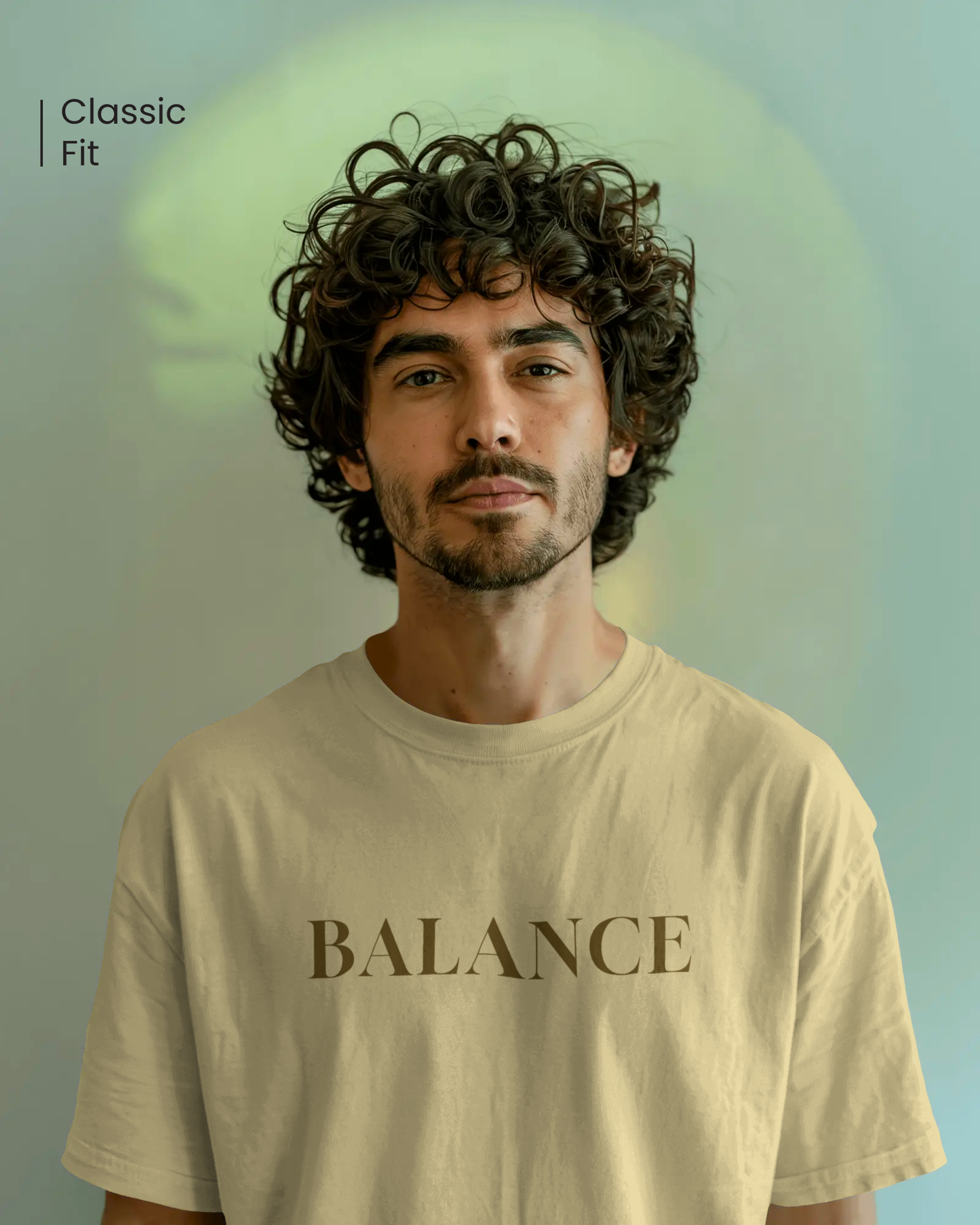 Male model in Qurrito’s Beige Balance Regular Fit Cotton T-Shirt styled casually for a minimalist streetwear look. The design embodies serious, focused, chill, and relaxed moods — a timeless piece that blends calm confidence with comfort.