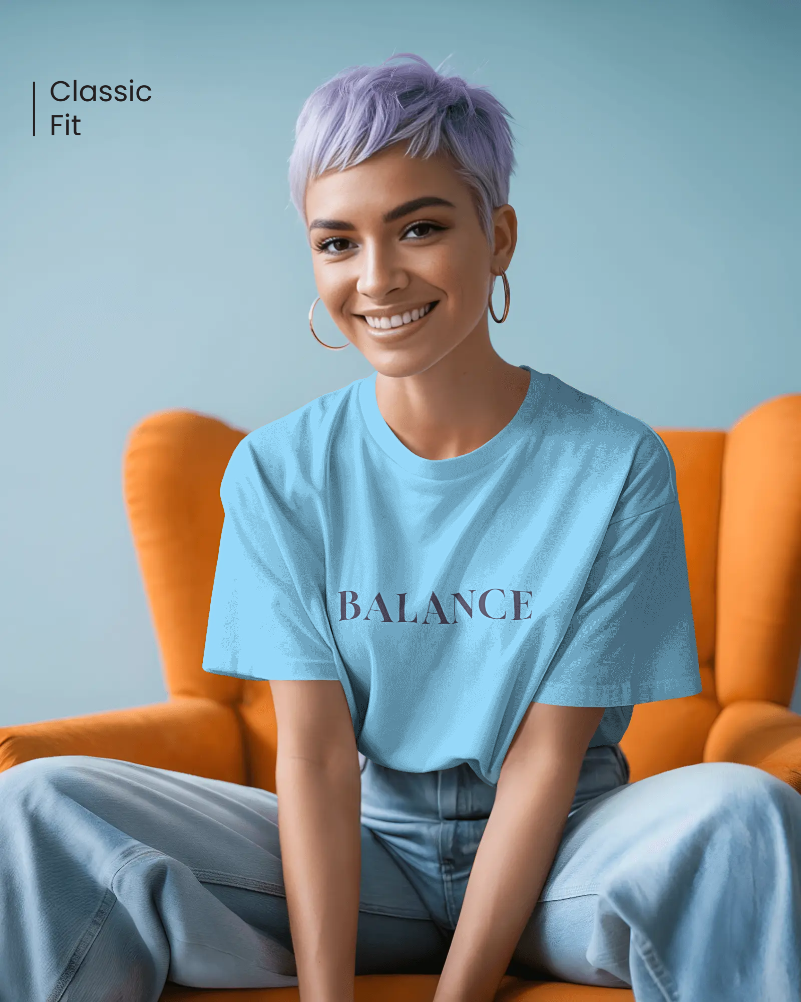 Smiling woman wearing Qurrito’s Balance Blue Regular Fit T-Shirt, styled casually with denim. The minimalist streetwear piece radiates chill, relaxed, serious, and focused mood vibes — blending calm energy with everyday comfort.