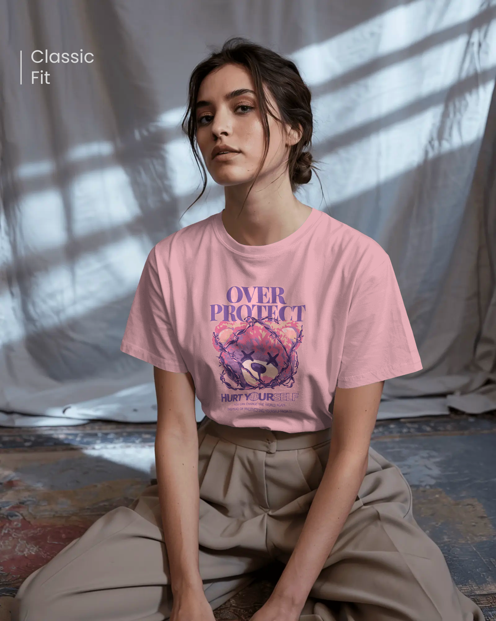 Woman in Qurrito’s Barbed Bear Edition Pink Graphic T-Shirt – Regular Fit. The artistic bear design with barbed wire detail gives off a mysterious, quirky, and confident streetwear vibe.