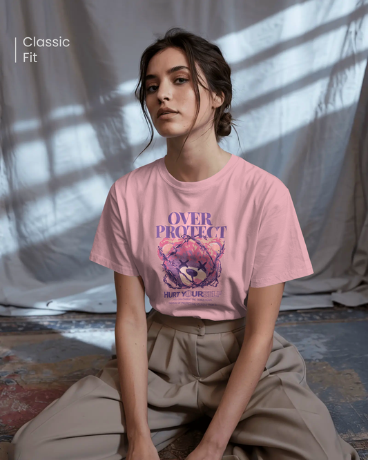 Woman in Qurrito’s Barbed Bear Edition Pink Graphic T-Shirt – Regular Fit. The artistic bear design with barbed wire detail gives off a mysterious, quirky, and confident streetwear vibe.