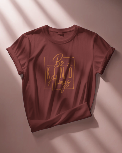 Close-up of Qurrito’s Be Kind Always Regular Fit T-Shirt in maroon cotton fabric. Featuring an elegant motivational quote, this tee embodies happy, cheerful, romantic, and affectionate mood energy — ideal for everyday wear with a kind spirit.