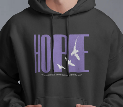 close up of model wearing Qurrito’s Black Streetwear Hoodie – Hope Unisex Oversized Hoodie made from premium heavy fabric, featuring “HOPE” graphic with white birds in purple print, showcasing relaxed oversized fit.