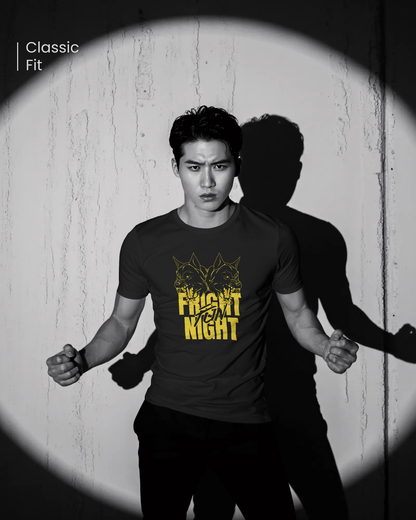 Bold Wolf Graphic T-Shirt for a confident style. Black Regular Fit tee with yellow "Fright Night" print. Night Prowler design by Qurrito brand apparel.
