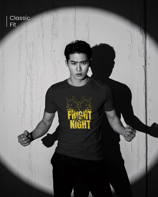 Bold Wolf Graphic T-Shirt for a confident style. Black Regular Fit tee with yellow "Fright Night" print. Night Prowler design by Qurrito brand apparel.