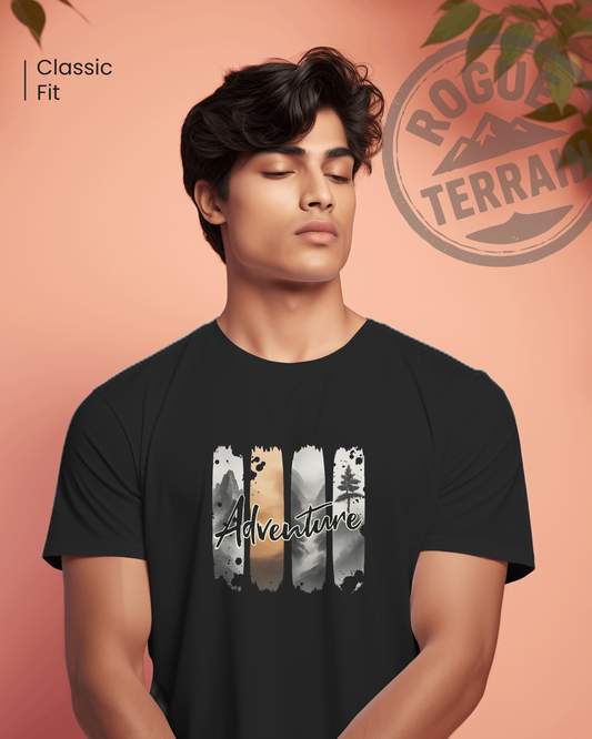 Close-up studio shot of a male model wearing the chill and relaxed "Adventure" classic-fit graphic t-shirt by Qurrito. The unisex top features a brushstroke landscape design, ideal for casual outdoors wear.