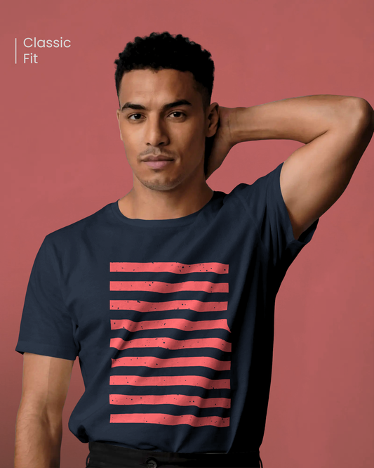 Male model with a confident and focused expression wearing the Qurrito Stripes of Boldness T-Shirt. This regular-fit unisex tee in navy with red stripes offers a bold, modern look.