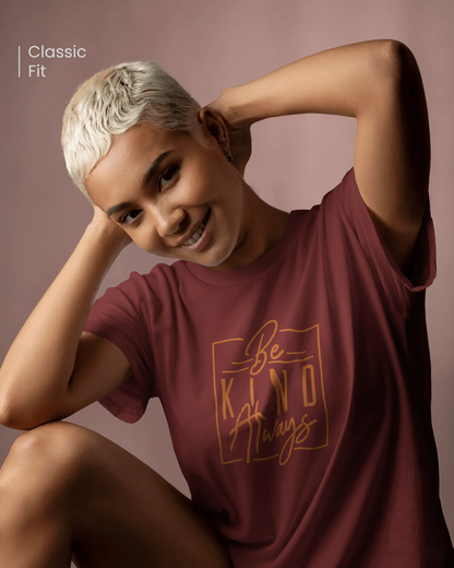 Smiling woman wearing Qurrito’s Be Kind Always maroon cotton t-shirt in a regular fit. This minimalist motivational design captures happy, romantic, cheerful, and affectionate moods — effortlessly blending positivity with everyday comfort.