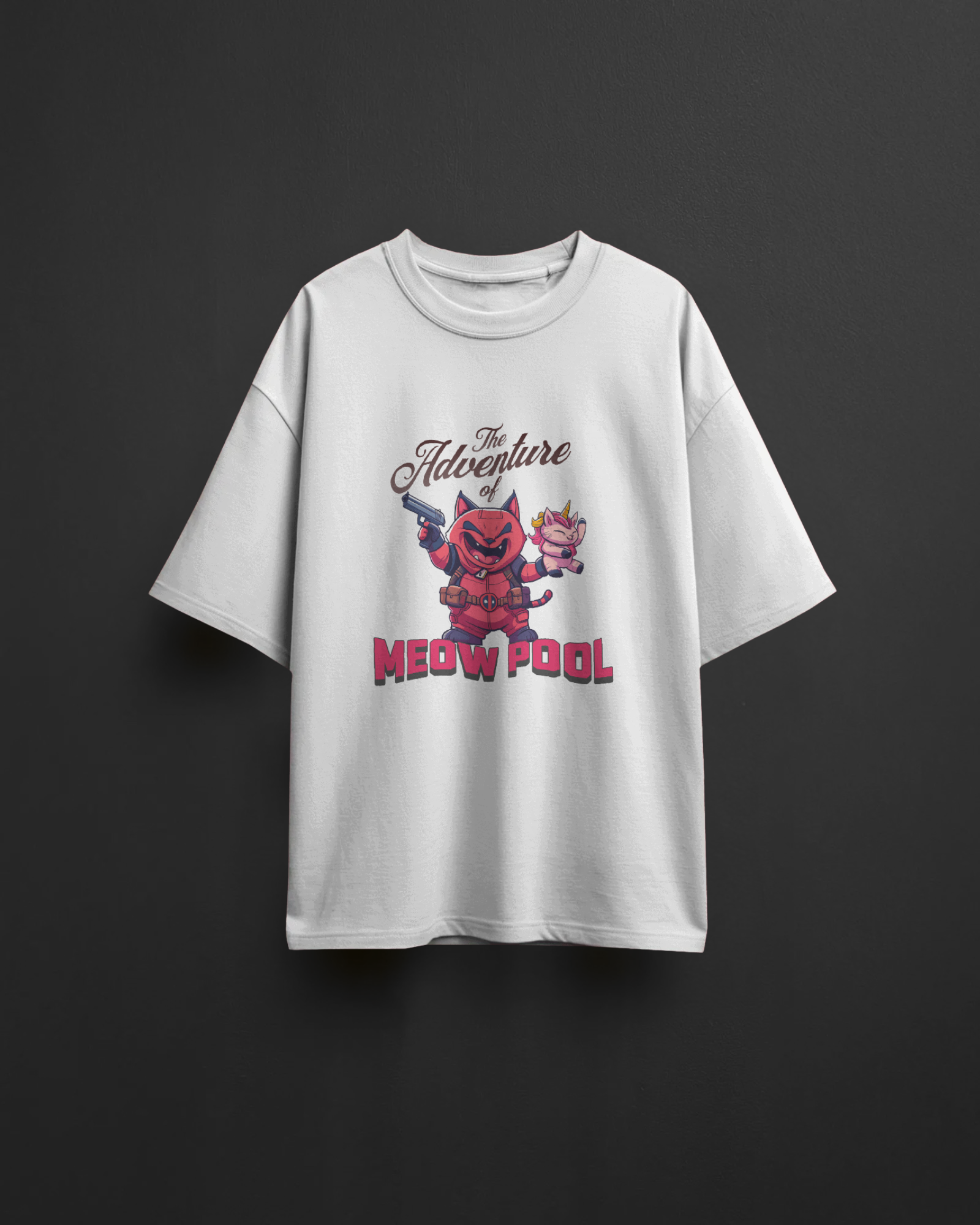 Funny "The Adventure of Meow Pool" oversized white t-shirt flat-lay against a dark background. A clean product shot of the unisex heavyweight graphic tee.