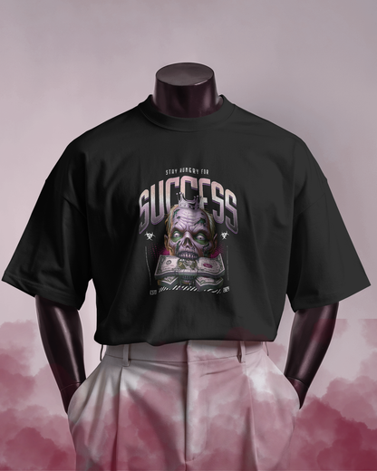 Close-up of Qurrito’s Gothic Streetwear T-Shirt – Success Zombie Crown Oversized Fit. The eerie zombie king design with neon hues exudes a mysterious, bold, and confident dark streetwear vibe.