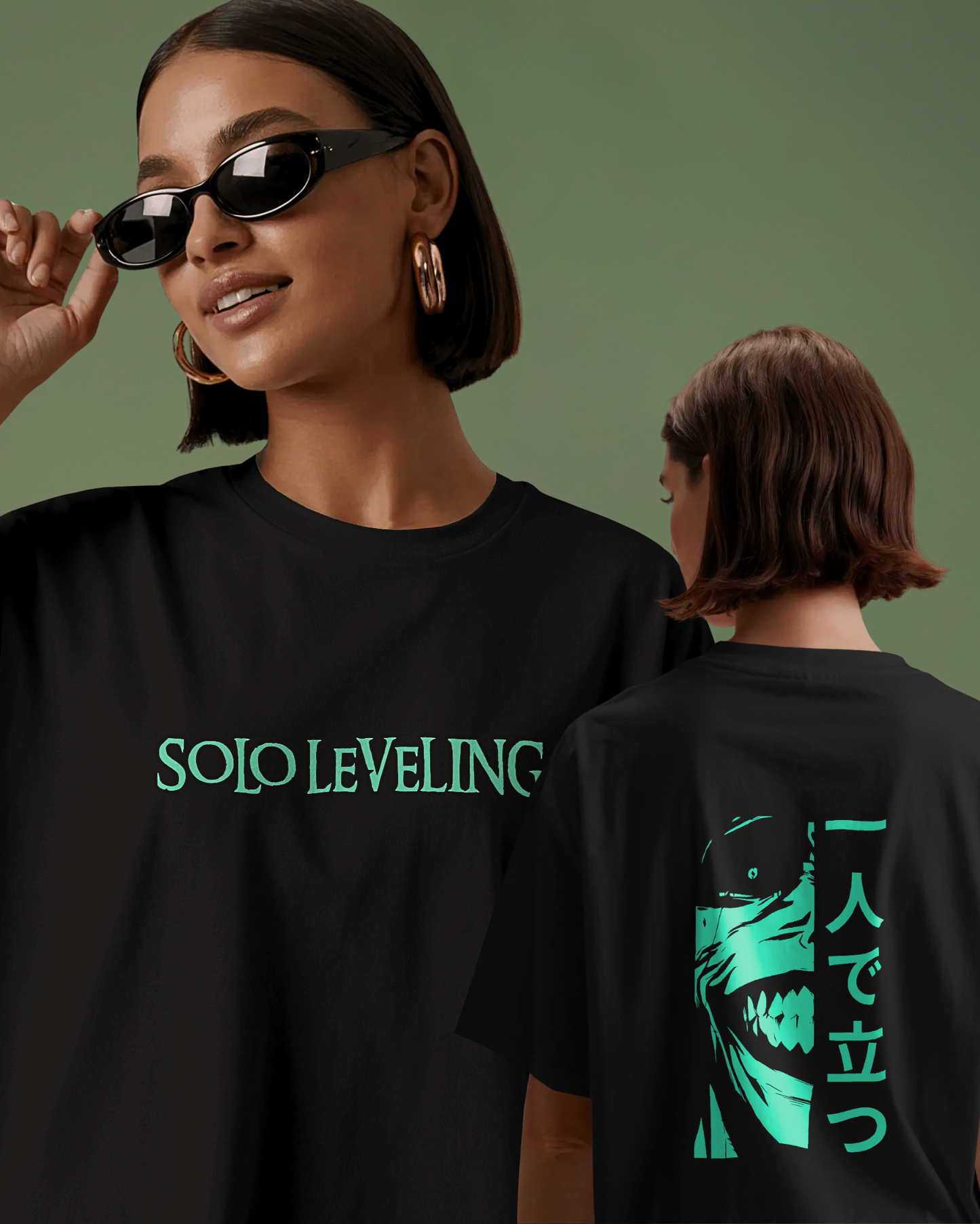 Female model wearing Qurrito’s Japanese Print Oversized T-shirt – Solo Leveling Stand Alone, styled in black with teal anime artwork and Japanese typography. The design embodies mysterious, dark, confident, bold, serious, and focused moods, making it a statement piece in modern anime streetwear fashion.