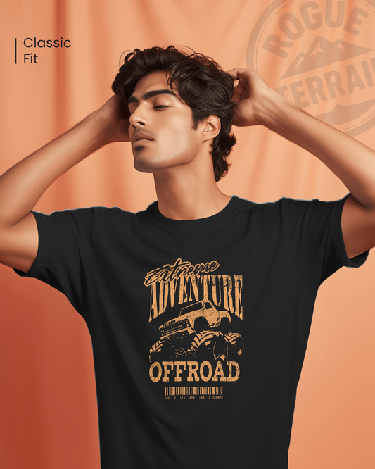 Male model styled in Qurrito’s Extreme Offroad Trailwear Monster Truck Graphic T-Shirt featuring bold typography and adventure graphics. The regular-fit cotton tee embodies energetic, pumped, playful, and quirky moods — ideal for those who live for thrill, motion, and expressive streetwear.