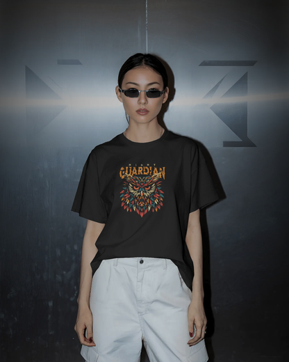 Serious, focused woman wearing Qurrito "Night Owl Dark Aesthetic" T-shirt. Mysterious mood Gothic design with colorful owl, regular fit.