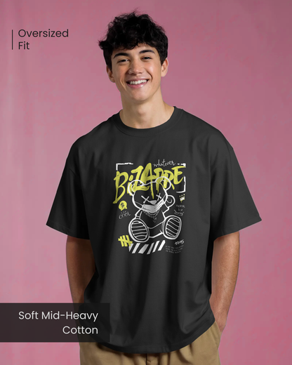 Man wearing the playful "Bizarre Bear" oversized graphic T-shirt. Features a dark, quirky mood street-style bear illustration. Soft Mid-Heavy Cotton Qurrito.