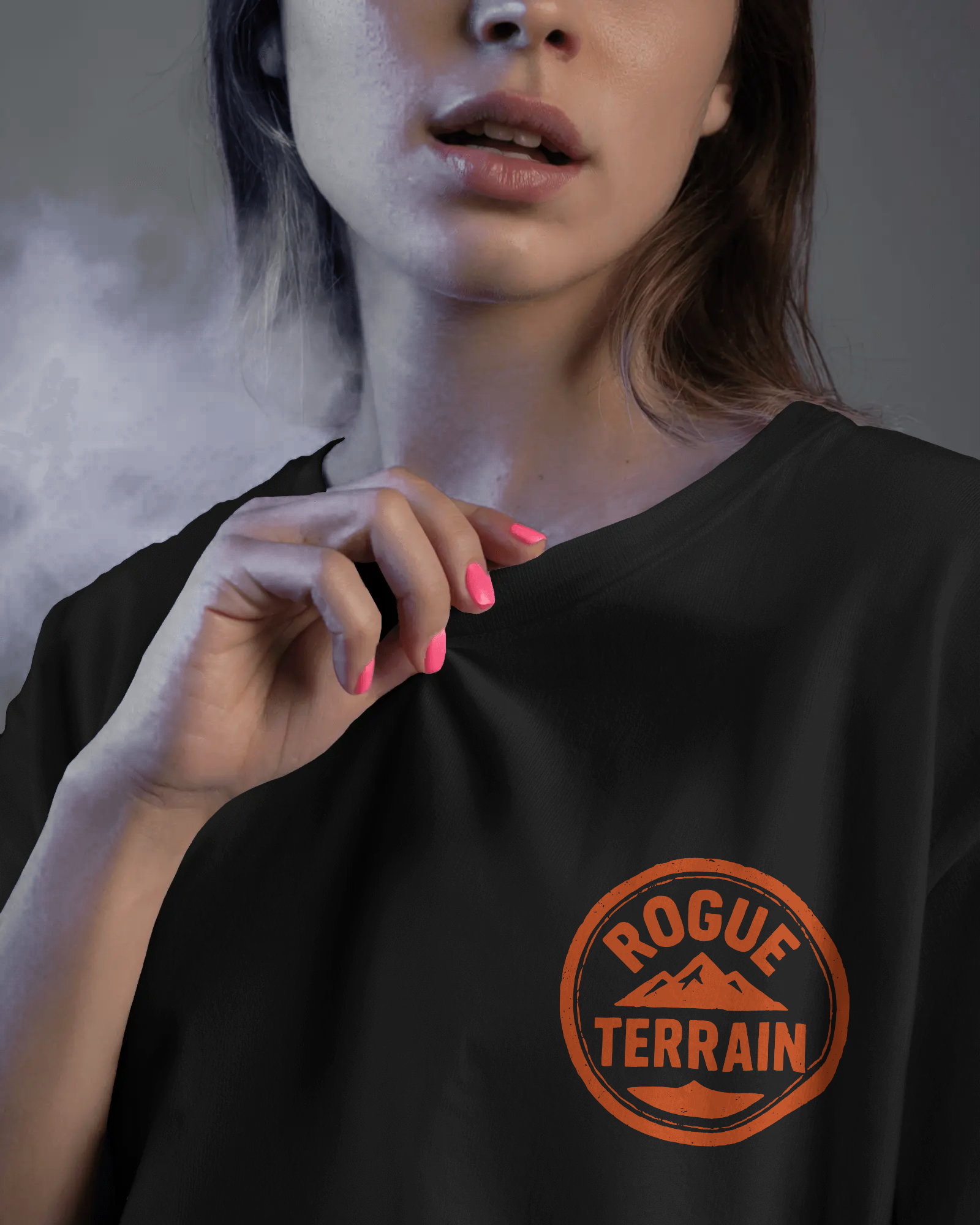 Front closeup of female model styled in Qurrito’s Oversized “Sunset Forest” Adventure Graphic T-Shirt with a bold sunset and mountain silhouette print. Designed in soft premium cotton, this tee embodies romantic, affectionate, chill, relaxed, happy, and cheerful moods — blending comfort with an expressive outdoor vibe.