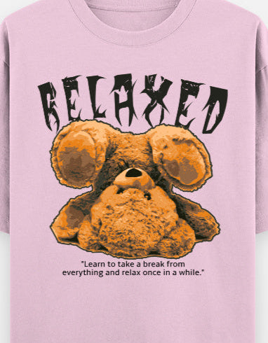 Pink casual cotton oversized t-shirt with upside-down teddy graphic and “RELAXED” text, perfect for laid-back, cozy streetwear looks.