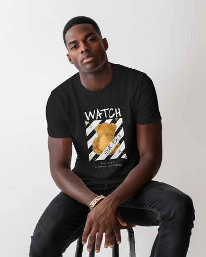 lack regular fit t-shirt featuring a back-facing teddy bear graphic with warning stripes, bold text “Watch Your Back,” and the phrase “Real world is behind your back.” Urban Graphic Wear by Qurrito.