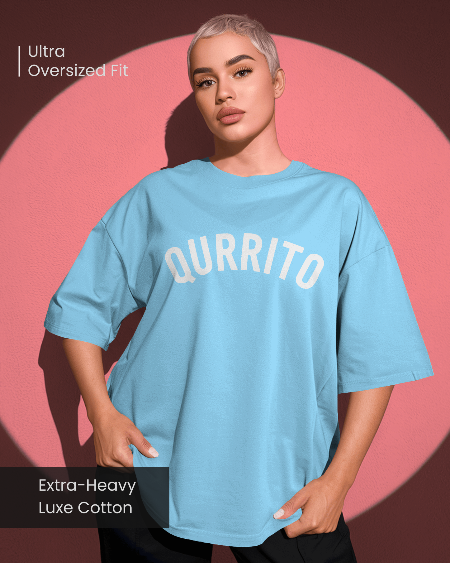 Confident woman posing in Qurrito’s Sky Blue Oversized T-Shirt made from extra-heavy luxe cotton. The cheerful and relaxed style gives a modern, minimal streetwear look, perfect for comfort-first fashion enthusiasts.