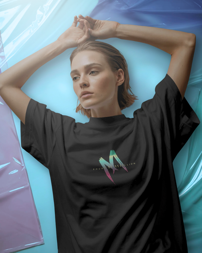 Woman wearing Qurrito’s Sound of Rebellion Oversized Punk Rock Tee in black extra-heavy cotton, styled for a minimal yet bold aesthetic. The relaxed unisex fit creates an edgy and confident dark mood streetwear look, ideal for women’s punk fashion or relaxed everyday outfits.